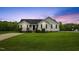 Charming single-story home with a well-maintained lawn and inviting curb appeal at 16 Monarch Trl, Selma, NC 27576