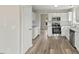 Modern kitchen features stainless appliances, white cabinets and tiled backsplash at 16 Monarch Trl, Selma, NC 27576