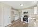 Clean, updated kitchen with stainless steel appliances, granite countertops, and bright white cabinets at 16 Monarch Trl, Selma, NC 27576