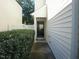 Inviting front entrance with a well-maintained walkway and freshly landscaped bushes at 1613 Beacon Valley Dr, Raleigh, NC 27604