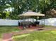 A backyard gazebo with seating at 1613 Beacon Valley Dr, Raleigh, NC 27604