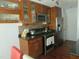Modern kitchen with stainless steel appliances, granite countertops, and ample cabinet space at 1613 Beacon Valley Dr, Raleigh, NC 27604