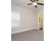Bedroom with carpet flooring and large window with blinds at 1636 Raven Falls Dr, Wendell, NC 27591