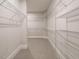 Spacious walk-in closet with built-in wire shelving at 1636 Raven Falls Dr, Wendell, NC 27591