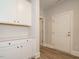 Bright entryway featuring white cabinets and modern countertops at 1636 Raven Falls Dr, Wendell, NC 27591