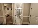Bathroom featuring a glass-enclosed shower, a toilet and access to bedroom at 1643 Wimberly Rd, Apex, NC 27523