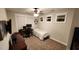 Cozy bedroom with carpet flooring, three windows and ceiling fan at 1643 Wimberly Rd, Apex, NC 27523