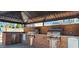 Outdoor community grilling area featuring stainless steel grills and brick surround at 1643 Wimberly Rd, Apex, NC 27523