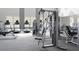 Gym featuring modern equipment and natural light from expansive windows at 1643 Wimberly Rd, Apex, NC 27523
