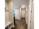 Hallway featuring a bench, coat rack, and hardwood floors at 1643 Wimberly Rd, Apex, NC 27523