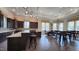 Clubhouse kitchen area with plenty of seating at bar and table at 1643 Wimberly Rd, Apex, NC 27523