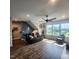 Spacious living room with hardwood floors, large windows, and comfortable seating at 1643 Wimberly Rd, Apex, NC 27523