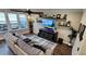 Cozy living room with plush seating, a modern TV, and stylish decor for comfortable living at 1643 Wimberly Rd, Apex, NC 27523