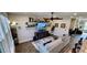 Bright living room featuring a comfortable sofa, contemporary decor, and ample natural light at 1643 Wimberly Rd, Apex, NC 27523