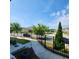 Inviting neighborhood scene with sidewalks and manicured lawns and black metal fence at 1643 Wimberly Rd, Apex, NC 27523