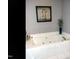 Corner bathtub with jets in bathroom featuring neutral walls and framed art at 2002 Clyde Bank Ct, Cary, NC 27511
