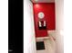 Bright red bathroom featuring modern fixtures and a soaking tub at 2002 Clyde Bank Ct, Cary, NC 27511