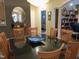 Inviting dining area showcases a dark-top table with seating for eight and stylish decor at 2002 Clyde Bank Ct, Cary, NC 27511
