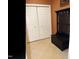 Hallway with coat rack, closet and neutral floor at 2002 Clyde Bank Ct, Cary, NC 27511