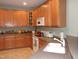 Spacious kitchen equipped with wooden cabinets, modern appliances, and plenty of counter space at 2002 Clyde Bank Ct, Cary, NC 27511