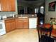 Kitchen view shows stainless dishwasher and sink, as well as a partial view to the open floor plan at 2002 Clyde Bank Ct, Cary, NC 27511