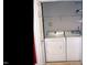 Laundry area with appliances and shelving at 2002 Clyde Bank Ct, Cary, NC 27511