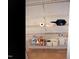 Pantry with wire shelving, cleaning supplies, and storage containers at 2002 Clyde Bank Ct, Cary, NC 27511