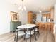 Open-concept dining area blends into the kitchen, creating a warm, inviting gathering space at 2067 White Pond Ct, Apex, NC 27523