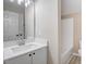 Bathroom with modern vanity, sink, mirror, a tub and shower combination with modern fixtures at 2120 Castle Pines Dr, Raleigh, NC 27604