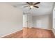 Bedroom featuring hardwood floors, a ceiling fan, and neutral paint tones at 2120 Castle Pines Dr, Raleigh, NC 27604