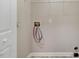 Laundry hookups in a small unfinished laundry area with painted walls and vinyl floors at 2120 Castle Pines Dr, Raleigh, NC 27604