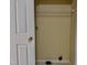 View of closet featuring hanging rack and some storage, neutral walls and white trim at , Raleigh, NC 27604
