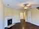 Comfortable living room area showcasing a fireplace and hardwood flooring at , Raleigh, NC 27604