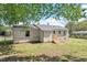 Spacious backyard with new deck, fence, and lush green grass at 2304 Nelson St, Raleigh, NC 27610