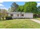 Charming single-story home featuring well-maintained lawn and landscape at 2304 Nelson St, Raleigh, NC 27610