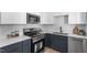 Updated kitchen showcasing modern appliances, stylish countertops, and plenty of cabinet space at 2304 Nelson St, Raleigh, NC 27610