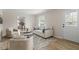Inviting living room featuring stylish furniture, neutral tones, and lots of light at 2304 Nelson St, Raleigh, NC 27610