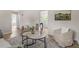 Serene living room featuring neutral decor and an open layout, creating a cozy and inviting space at 2304 Nelson St, Raleigh, NC 27610