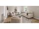 Inviting living room showcasing modern decor, comfortable seating, and wood flooring at 2304 Nelson St, Raleigh, NC 27610
