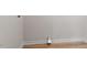 Empty utility room with light colored wood-look flooring at 2304 Nelson St, Raleigh, NC 27610