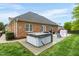 Spacious backyard features a hot tub and a playhouse at 2326 Marlow Dr, Burlington, NC 27215