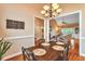 Charming dining room with hardwood floors and decorative accents, perfect for entertaining at 2326 Marlow Dr, Burlington, NC 27215