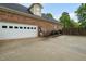 Attached two-car garage with a wide driveway, providing ample parking and storage at 2326 Marlow Dr, Burlington, NC 27215