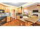 Well-lit kitchen with stainless steel appliances, granite countertops, and a view to the living room at 2326 Marlow Dr, Burlington, NC 27215