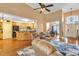 Open-concept living area showcasing the kitchen, dining, and living room layout with hardwood floors at 2326 Marlow Dr, Burlington, NC 27215