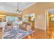 Spacious living room with hardwood floors, vaulted ceilings, natural light, and comfortable seating at 2326 Marlow Dr, Burlington, NC 27215