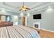 Spacious main bedroom with tray ceiling, carpet, and a fireplace at 2326 Marlow Dr, Burlington, NC 27215