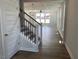 New construction home featuring hardwood floors, a staircase, and an open floorplan at 245 N Maple Walk Dr # 219, Garner, NC 27529