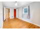 Bedroom featuring natural light, hardwood floors, and a closet at 2721 Thelma St, Durham, NC 27704
