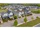 Aerial view showcasing a vibrant neighborhood with a mix of architectural styles and well-kept landscaping at 282 Granite Mill Blvd, Chapel Hill, NC 27516